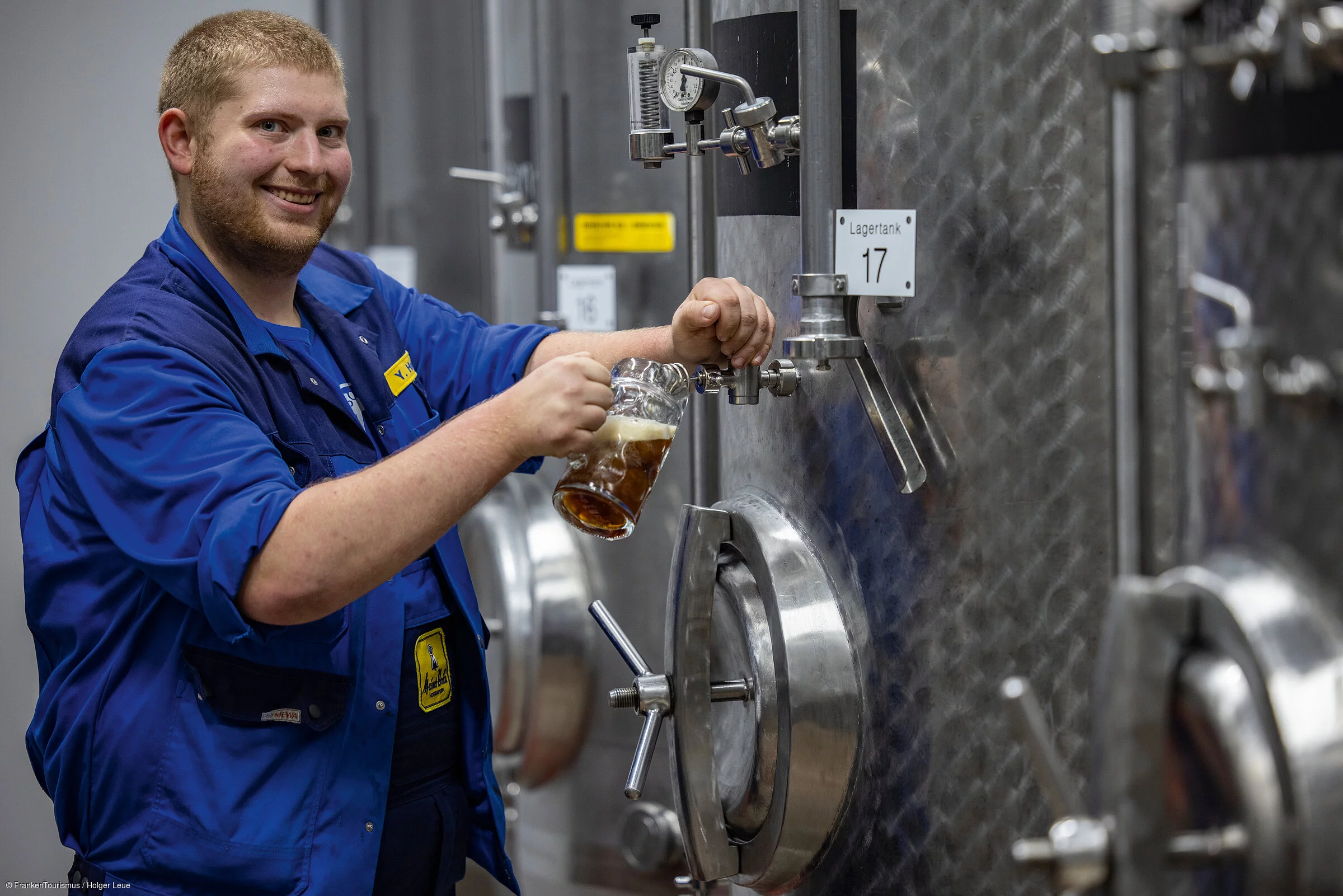 Brewery worker Yannick Herrmann of Meinel Bräu brewery, Hof, Franconia, Bavaria, Germany