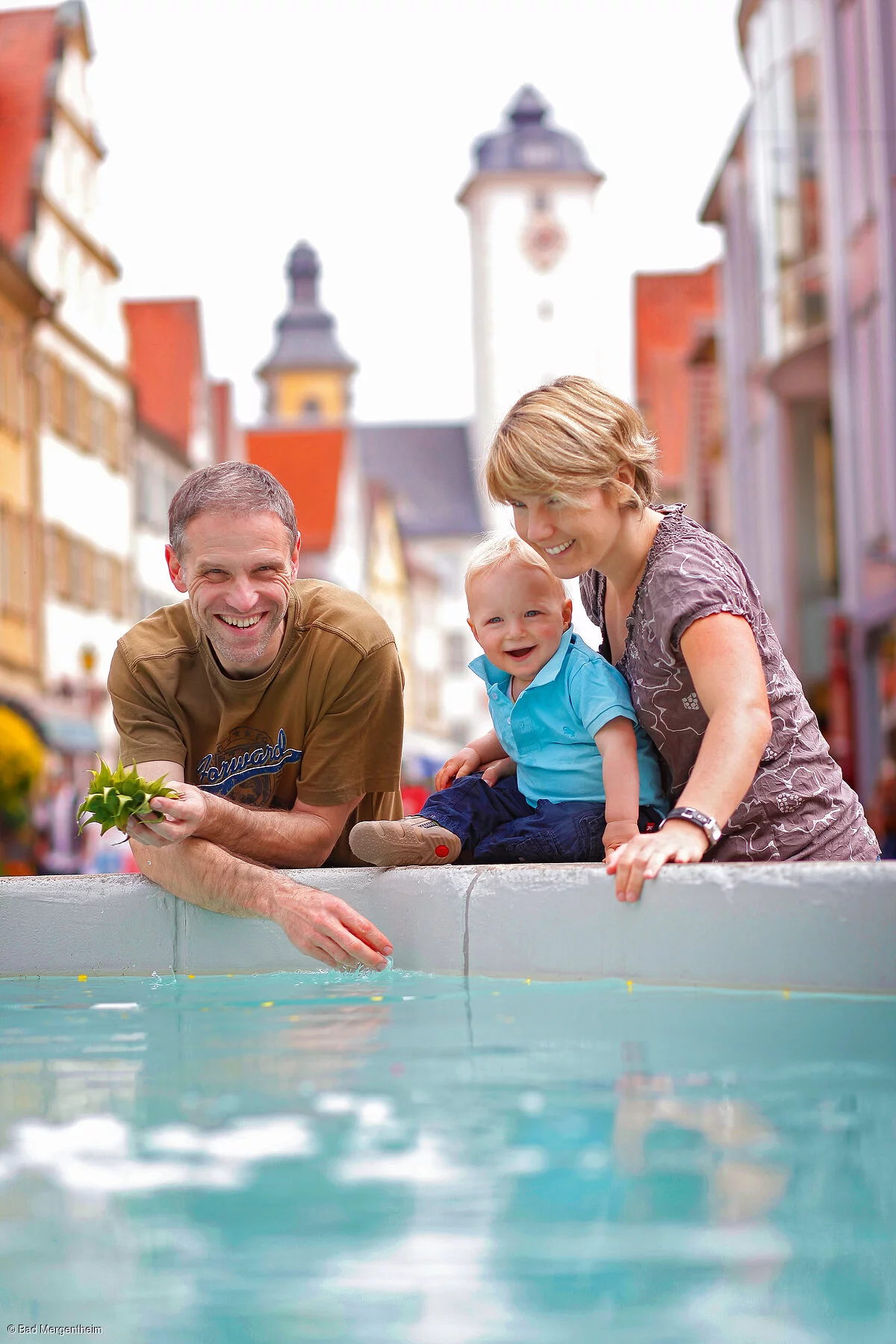 Familie am Milchlingsbrunnen