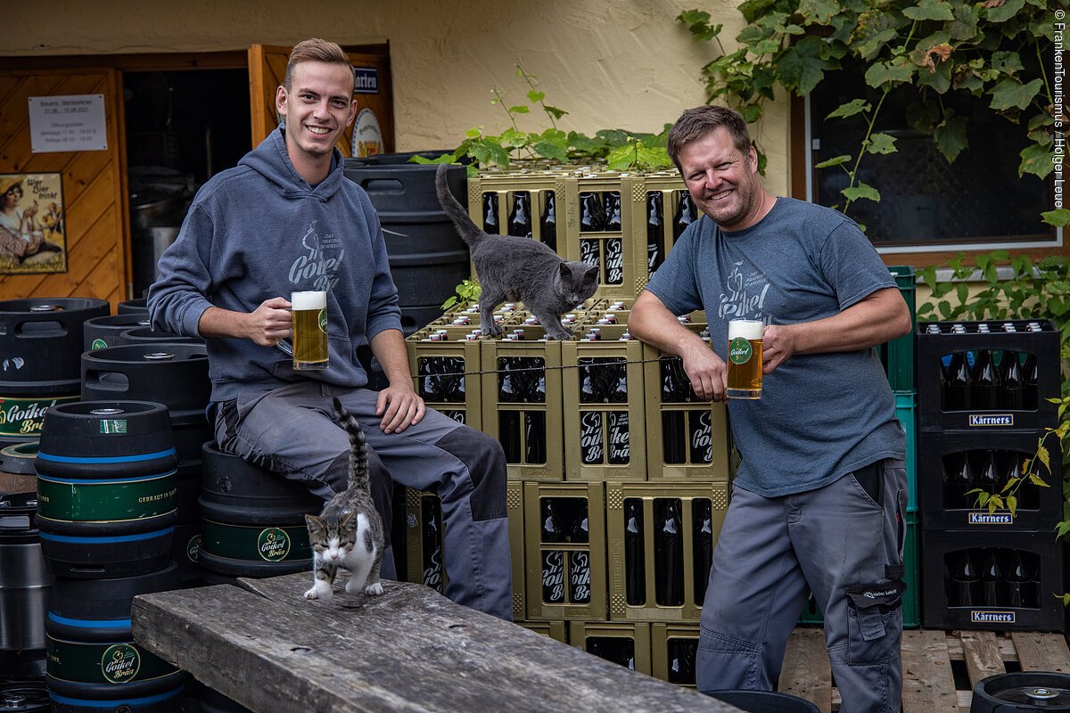 Brewery worker Johannes Marschall and Brewmaster Manuel Müller of Goikel Bräu brewery, Lohr am Main Halsbach, Bavaria, Franconia, Germany